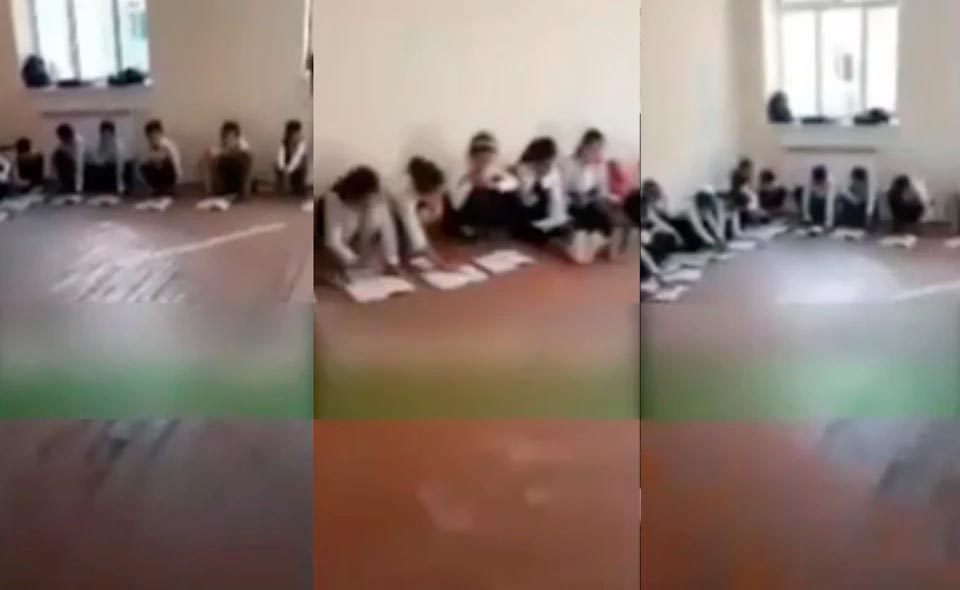Учителей, которые распространили постановочные фото детей, занимающихся на полу, наказали. Они подорвали "честь и достоинство" школы 